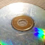 Damaged optical disk with distribution kit